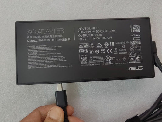Close-up of the new ASUS rectangle plug square connector for ROG Strix G18 G815 running NVIDIA RTX 5070 laptop GPU